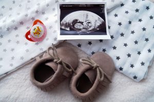 pregnancy announcement, pregnant, pregnancy test, positive test, flowers and lace, having a baby, ultrasound photo, mom to-be