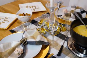 hosting, NYE, dinner, cheese fondue, midi dress, recipe, cooking for guests, bump style, happy new year, NYE ideas, hostess, table scape, NYE table decor
